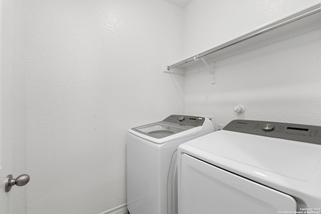 laundry area with washer and dryer