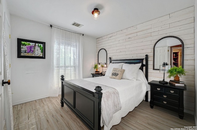 bedroom featuring light hardwood / wood-style floors