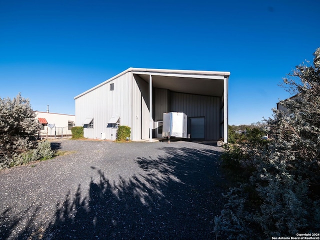 exterior space with a carport