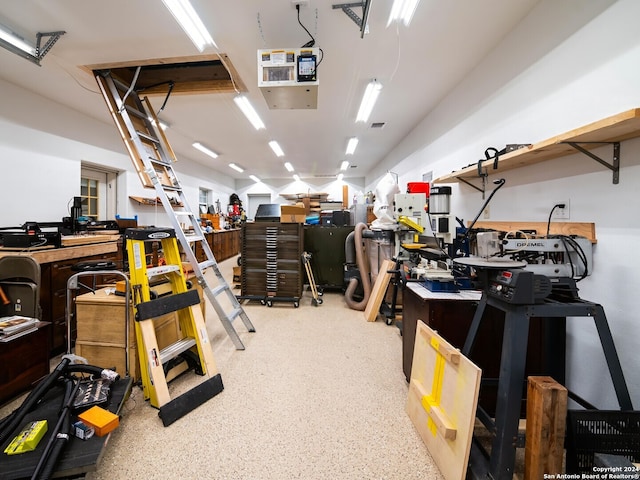 garage with a workshop area