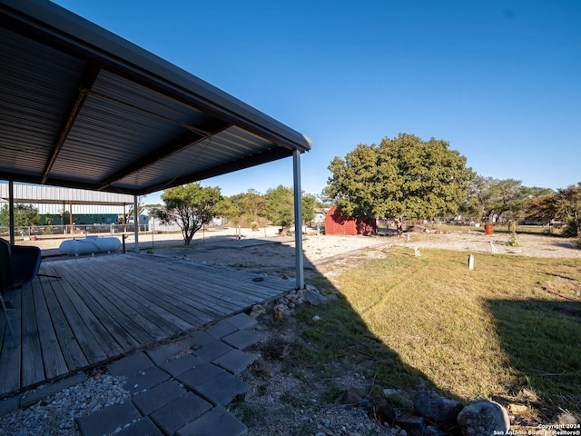 view of yard featuring a wooden deck