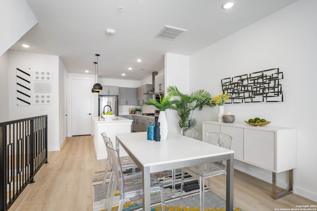 dining area featuring light hardwood / wood-style floors