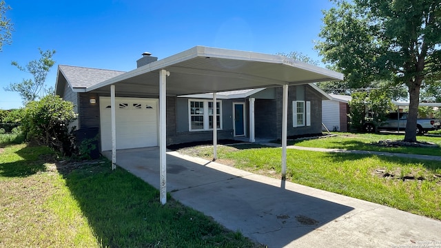 view of front of house featuring a garage and a front lawn