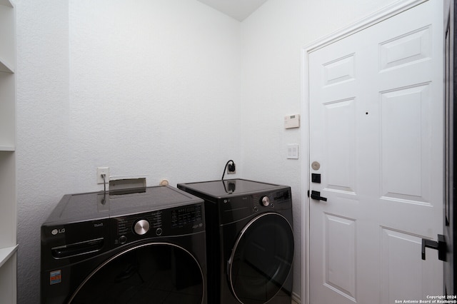 laundry area featuring washer and clothes dryer