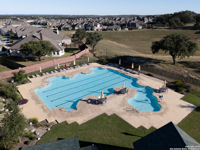 view of swimming pool with a patio