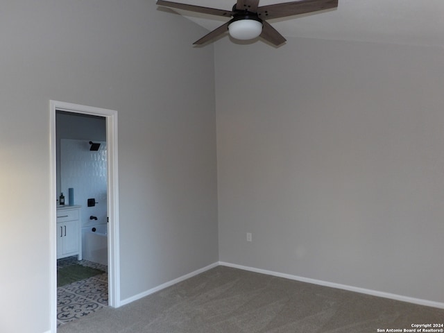 spare room with ceiling fan and carpet floors