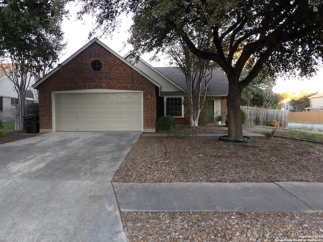 ranch-style home with a garage