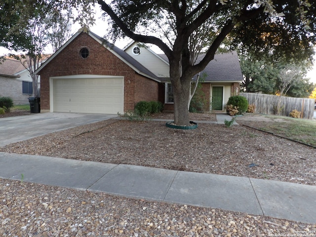 ranch-style home with a garage