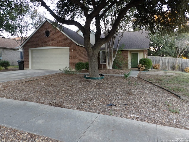 ranch-style home with a garage