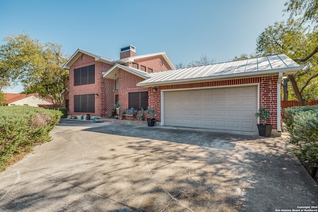 view of front of home featuring a garage