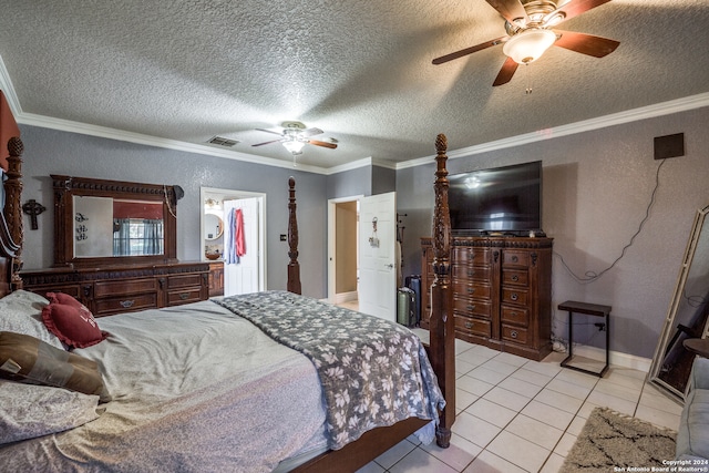 tiled bedroom with ceiling fan, crown molding, and a textured ceiling