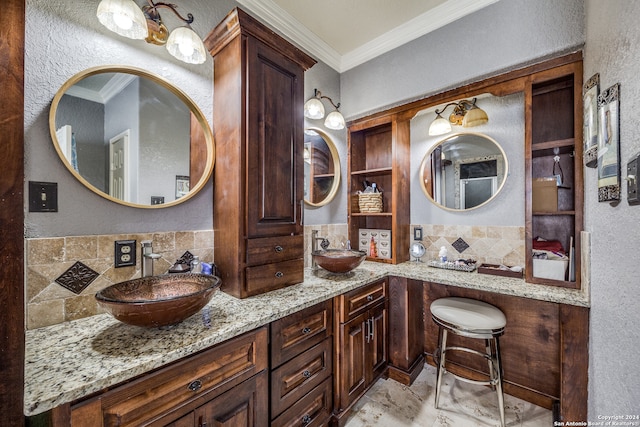 bathroom with vanity, tasteful backsplash, and ornamental molding