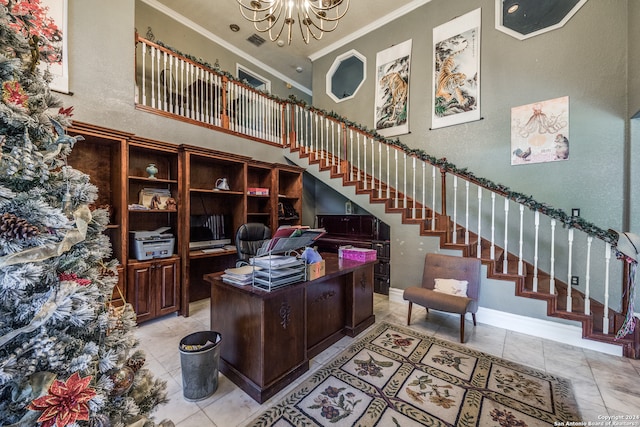 office area with a towering ceiling, light tile patterned floors, a chandelier, and ornamental molding