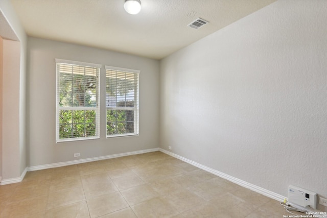 view of tiled empty room