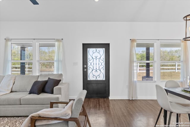 living room with a wealth of natural light and hardwood / wood-style floors