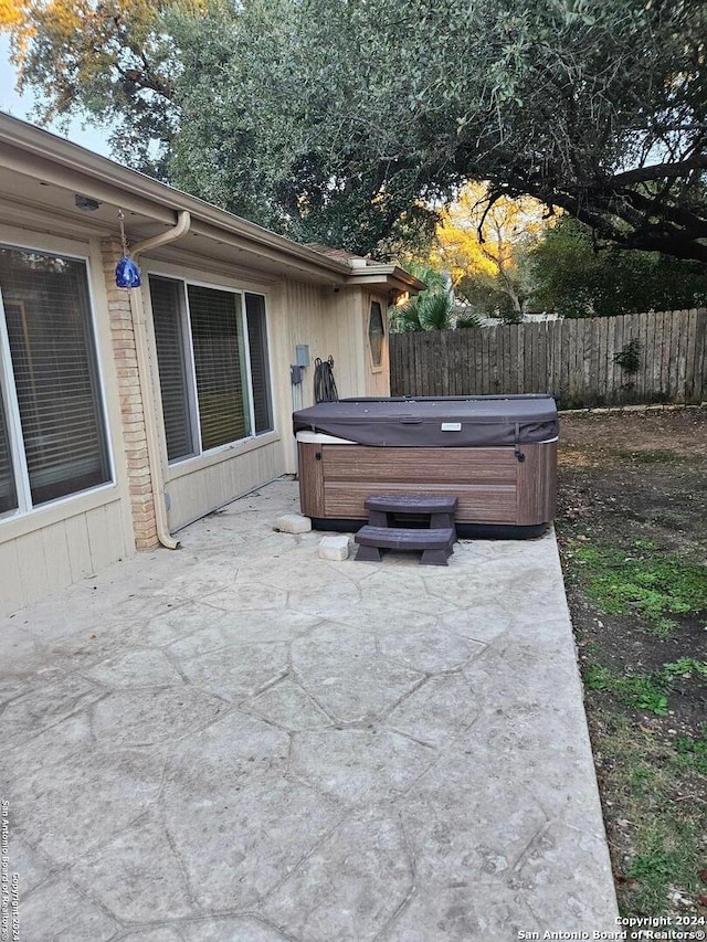 view of patio featuring a hot tub