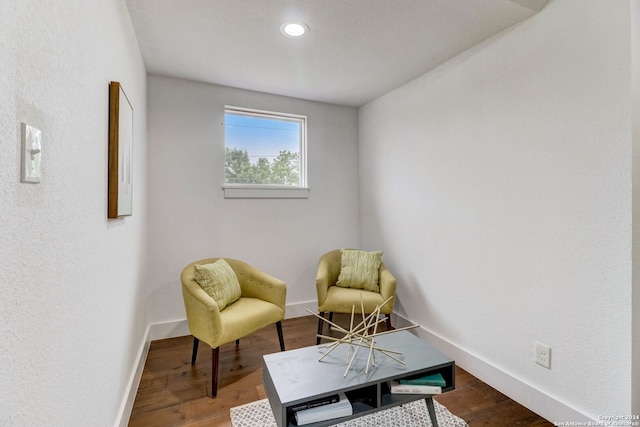 sitting room with hardwood / wood-style floors