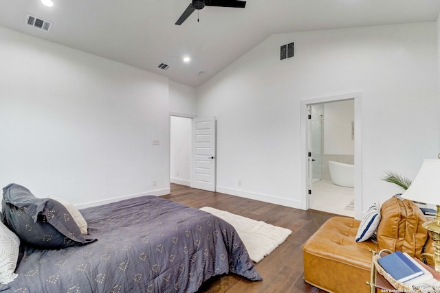 bedroom with dark hardwood / wood-style flooring, connected bathroom, vaulted ceiling, and ceiling fan