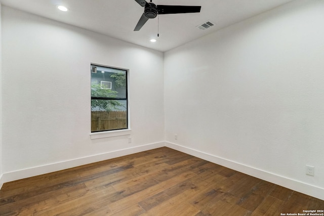 unfurnished room featuring ceiling fan and hardwood / wood-style floors