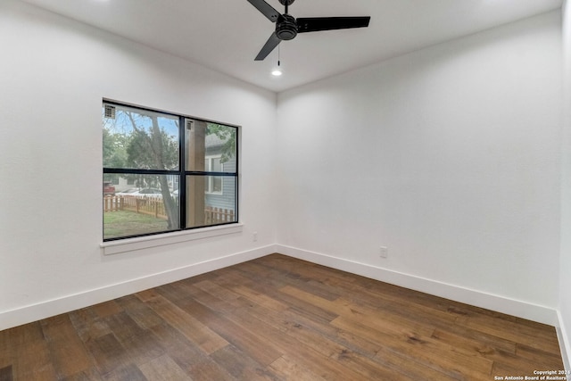 unfurnished room with ceiling fan and wood-type flooring