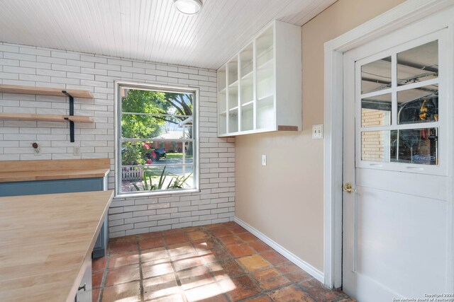 interior space with brick wall