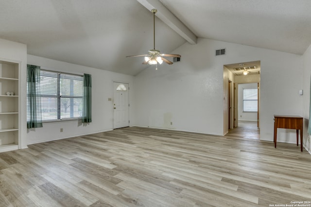 unfurnished living room featuring lofted ceiling with beams, light hardwood / wood-style floors, and ceiling fan