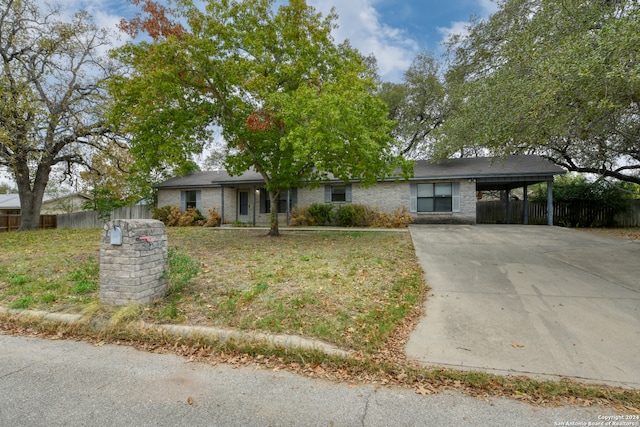 single story home with a carport