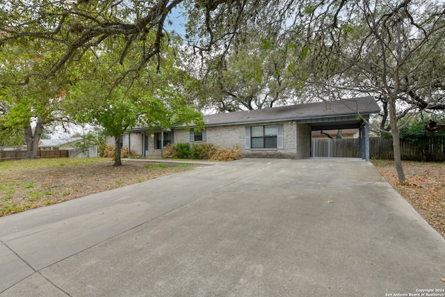 view of front of property with a carport