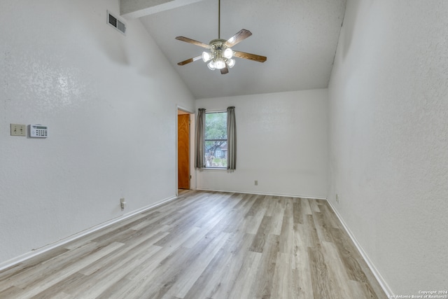 spare room with ceiling fan, light hardwood / wood-style flooring, and high vaulted ceiling