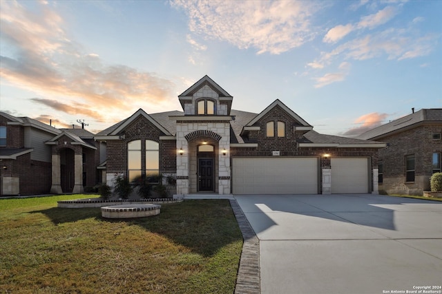 french country style house featuring a yard