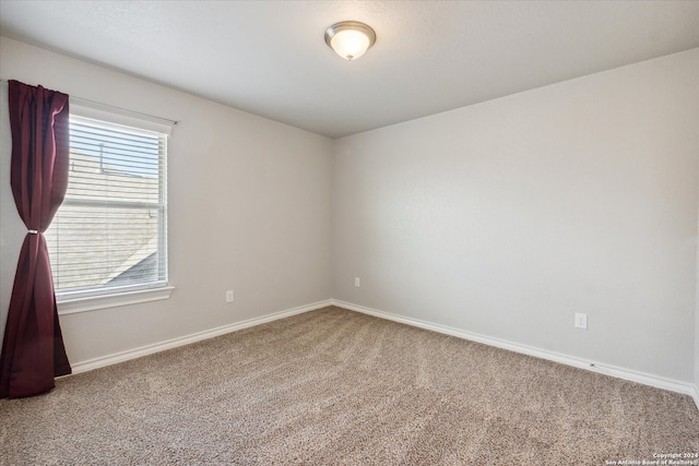 spare room with carpet flooring