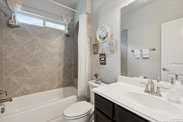 full bathroom with shower / bath combo with shower curtain, vanity, and toilet