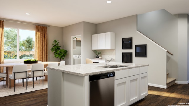 kitchen featuring dark hardwood / wood-style flooring, stainless steel dishwasher, sink, white cabinets, and an island with sink