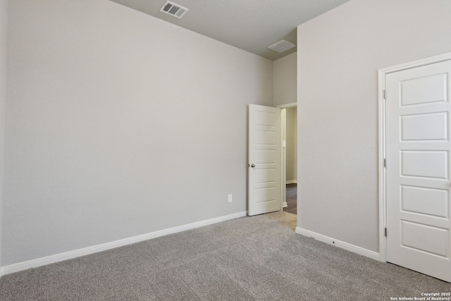 unfurnished bedroom with light carpet