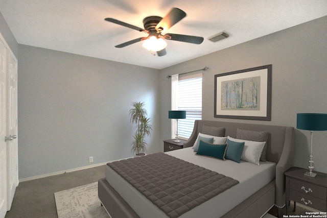 carpeted bedroom featuring ceiling fan