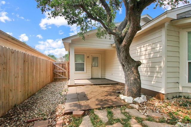 doorway to property featuring a patio area