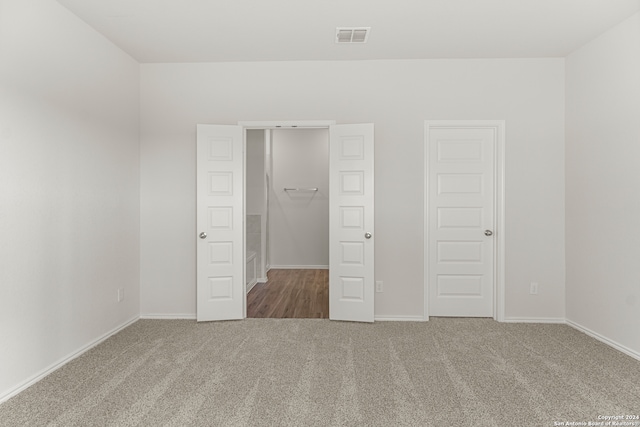 unfurnished bedroom featuring carpet floors