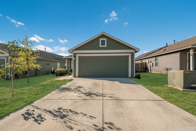 single story home with a front yard and a garage