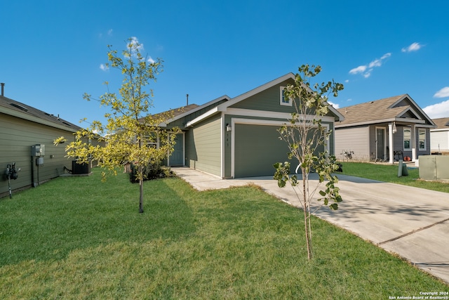 ranch-style house with a front yard and a garage