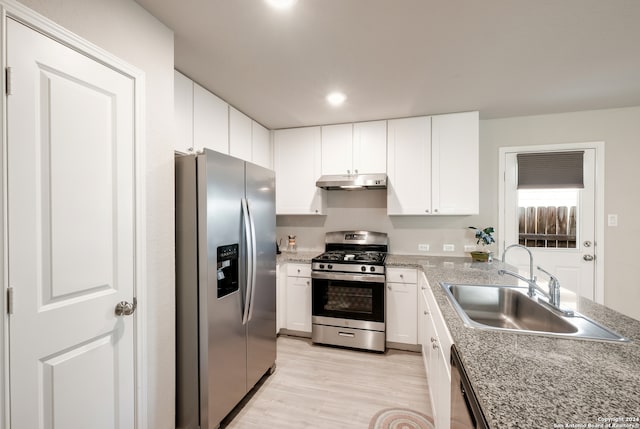 kitchen featuring white cabinetry, light hardwood / wood-style flooring, stainless steel appliances, and sink