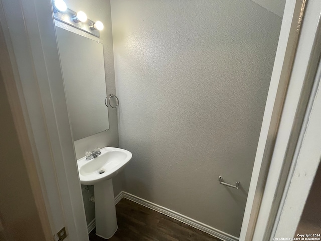 bathroom featuring wood-type flooring