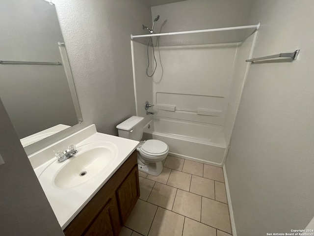 full bathroom featuring bathing tub / shower combination, tile patterned flooring, vanity, and toilet