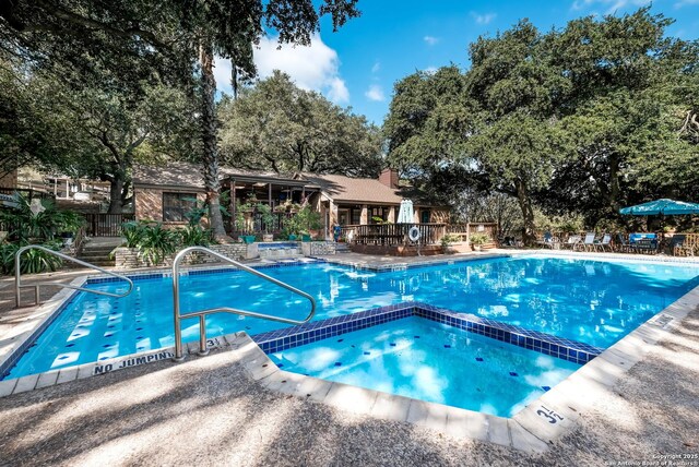 4212 Medical Dr Unit 902, San Antonio, TX 78229 - community pool featuring view of wooded area