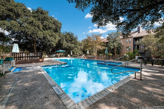 4212 Medical Dr Unit 902, San Antonio, TX 78229 - wooden terrace featuring a ceiling fan and outdoor dining area