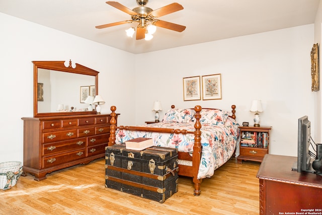 bedroom with ceiling fan and light wood-type flooring