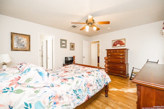 bedroom with ceiling fan and light hardwood / wood-style flooring