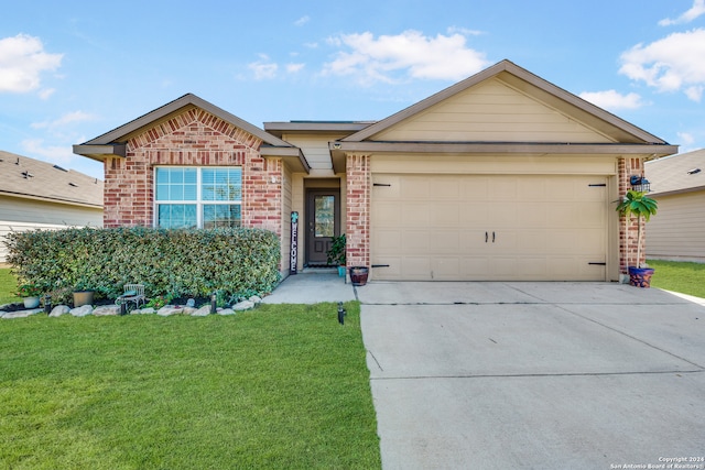 single story home with a front yard and a garage