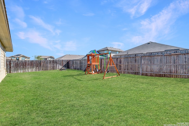 view of yard with a playground