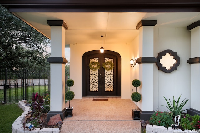 doorway to property featuring french doors