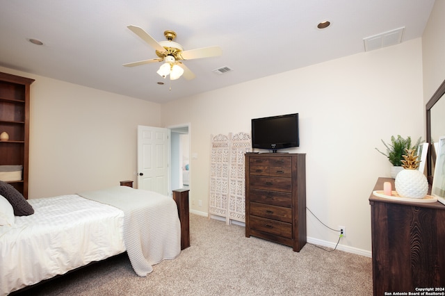 bedroom featuring ceiling fan and light colored carpet